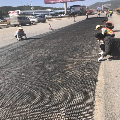道路沥青防裂玻纤土工格栅网30kn玻纤格栅生产厂家批发自粘格栅厂图5